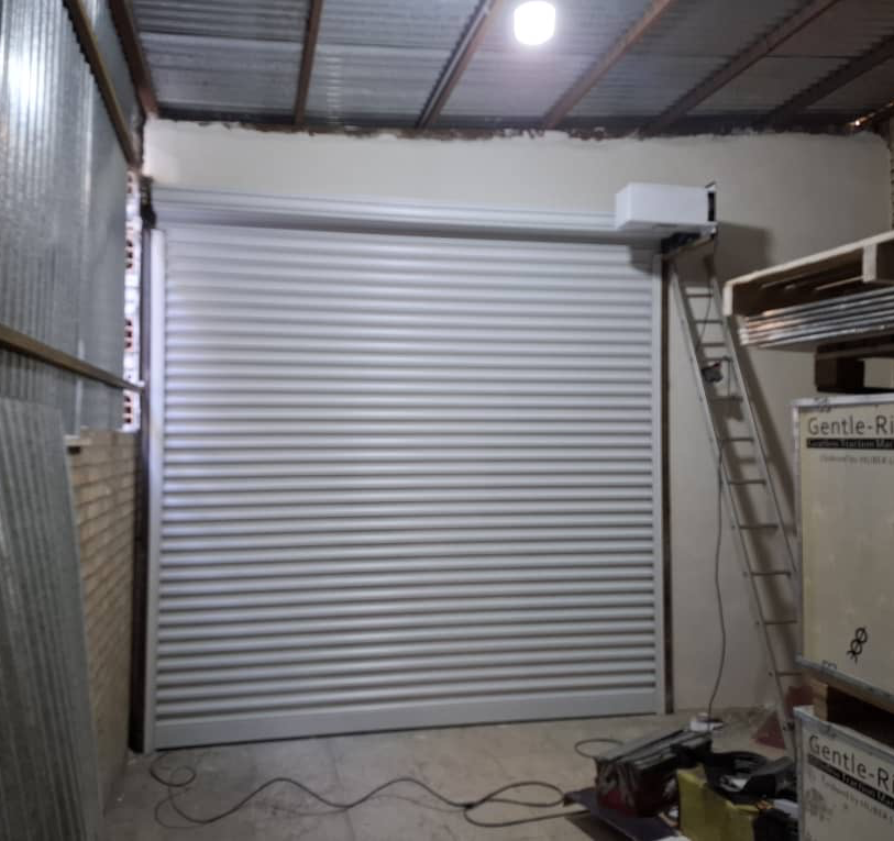 پروژه: اجرای کرکره برقی ضدسرقت فولادی در شهرک صنعتی عباس‌آباد